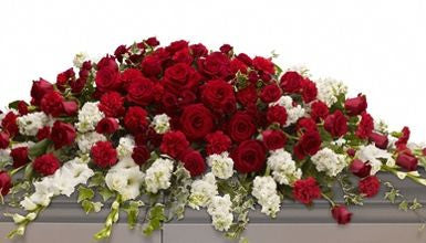 Sympathy flower arrangement for the casket