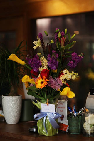Mixed flower bouquet with vase